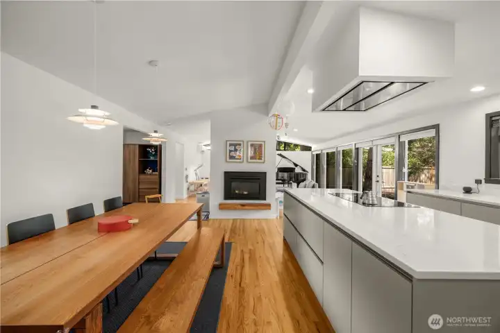 View: Dining Area (left)/Kitchen (right)/Living Room & Back Yard (partial)