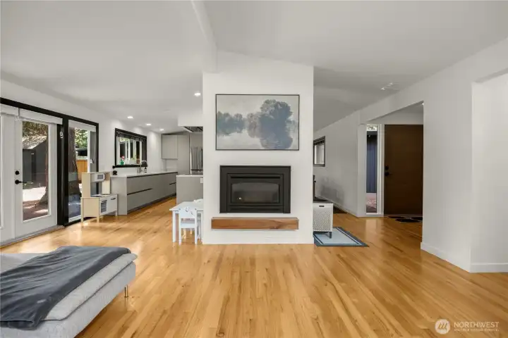 Rare double-sided fireplace: Gas line available for activation at Owner’s discretion!