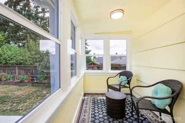 Sun room overlooks back yard and gardens. Sun room overlooks back yard and gardens.