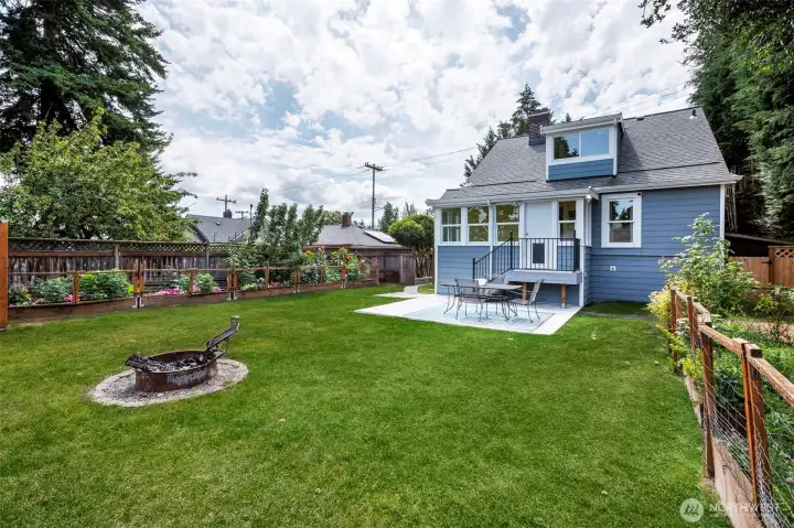 Back yard with fire pit. Back yard with fire pit.