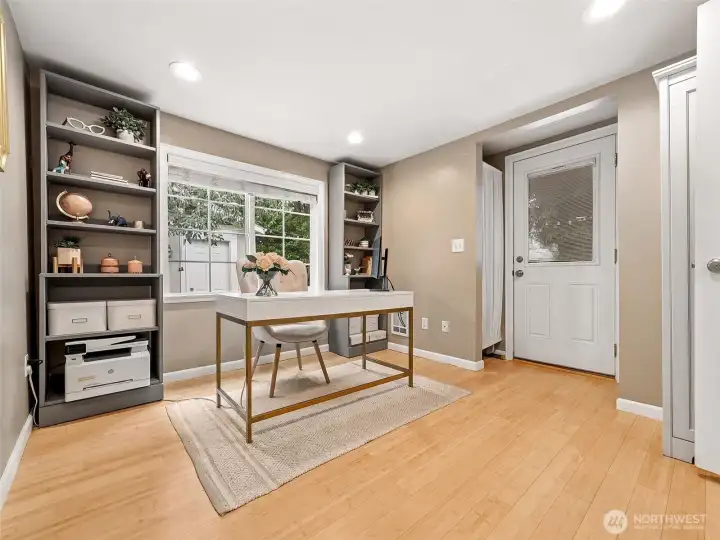 3 of 3 bedrooms - located at the back of the house. Here, used as an office, with the convenience of an exterior door.