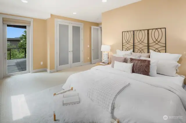 This oversized ensuite bedroom on the first level is ideal for guests, au pere, or home office. Complete with large amounts of closet storage and access to deck facing west.
