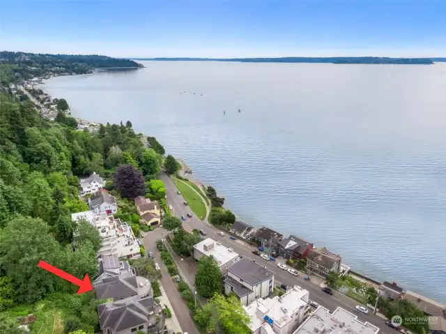 Enjoy the quiet of this tree-lined street, but with proximity to all that Alki has to offer, just a mile up Beach Drive!
