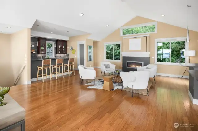 Vaulted ceilings and gorgeous strand bamboo flooring add to this engaging space.