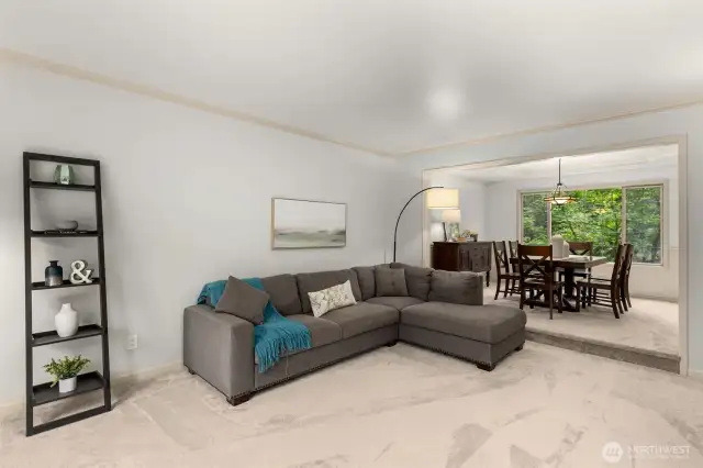 Living room flows seamlessly into the dining room.