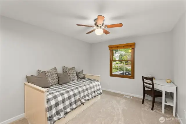 1 of 3 spacious upstairs bedrooms.