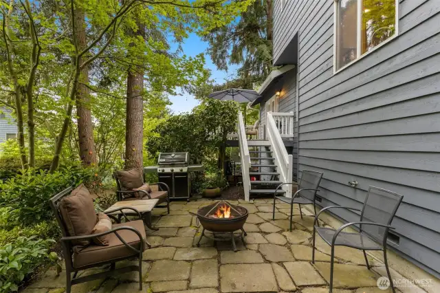 Stamped concrete patio on lower part of backyard.