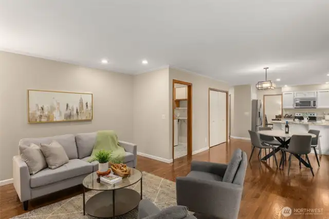 Open floor plan with kitchen leading to eating nook and family room.