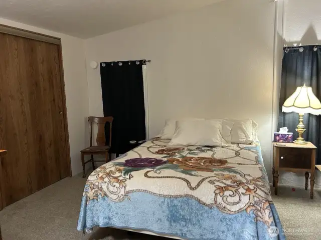 Primary Bedroom with a Queen sized bed.  Can easily fit a King sized.