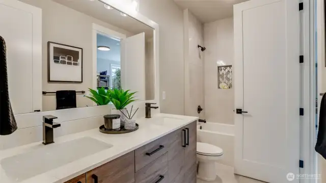 Full Guest Bath on the Upper Level. (Model Home photo)