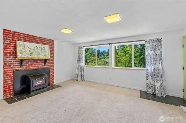 You will love the rec room with the cozy wood burining fireplace.