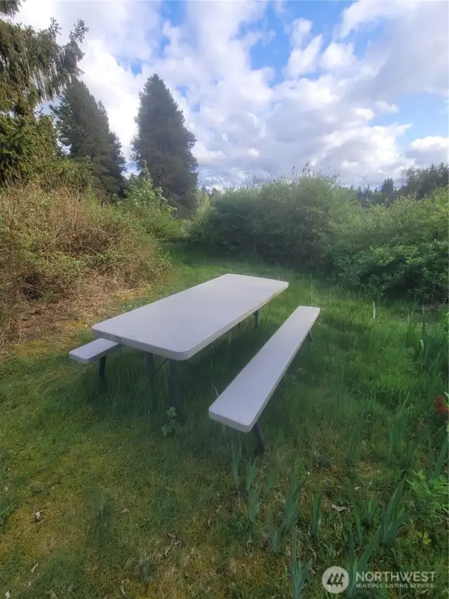 another picnic table up by the waterfront.