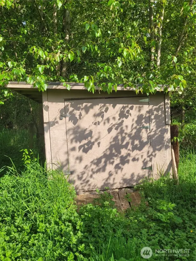 Riding Lawn mower shed.  Mower comes with farm.