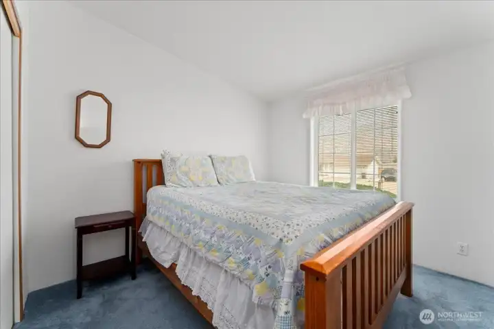 Large sunlit third bedroom