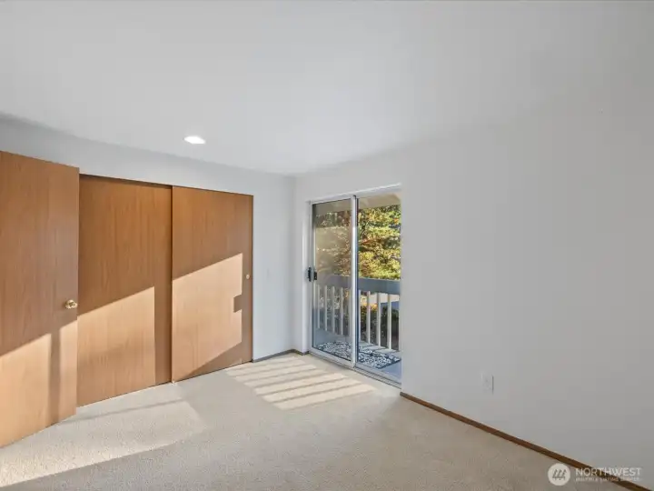 Second bedroom with private balcony and large closet