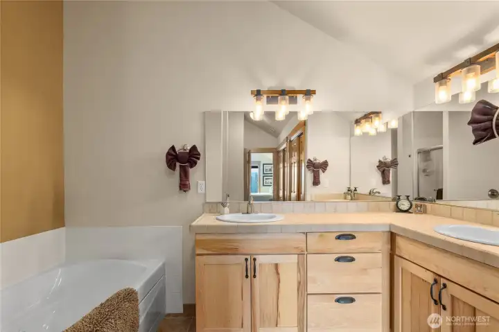 Double sink vanity in the primary suite.