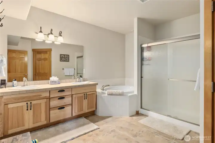 Large shared bath with jetted tub.