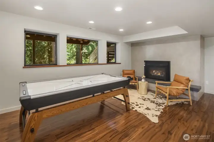 Large family room with gas fireplace.