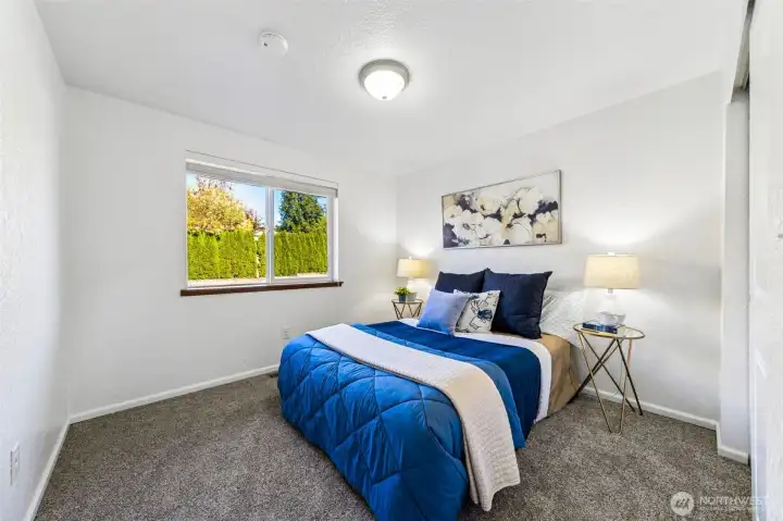 A queen size bed fits comfortably in bedroom two as well as many other furniture designs and uses.