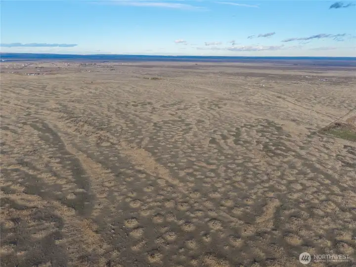 Photo is from the southwest boundary looking northeast. Access is from Road 11 at the corner of the green area, towards Road A.