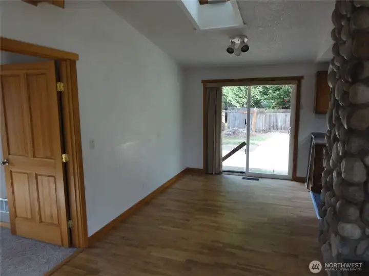 Eating area off kitchen. Primary bedroom to the left.