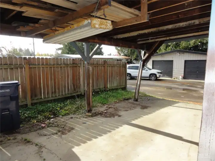 Carport off alley.