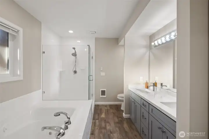 Freshly renovated Primary Bathroom with soaking tub and shower