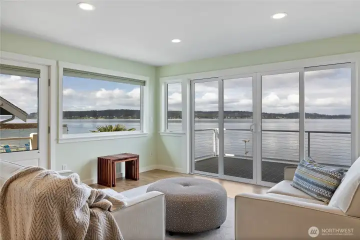 Living room with incredible views of The Sound & Olympics!