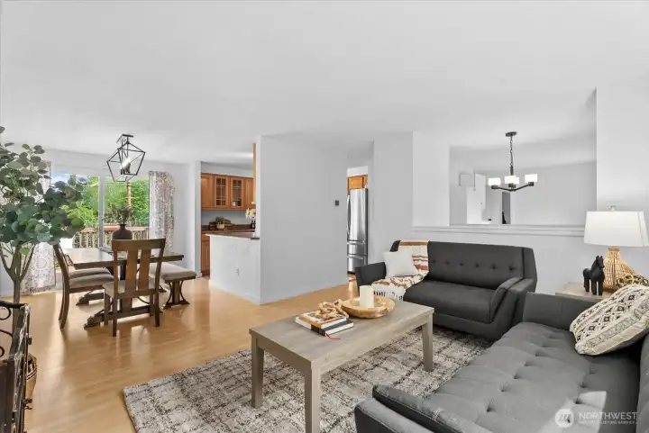 living room flowing to dining space