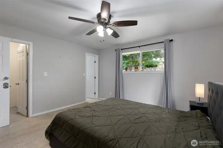 primary bedroom with walk in closet