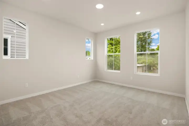 Primary bedroom with extra windows and mini-split AC/Heat Primary bedroom with extra windows and mini-split AC/Heat