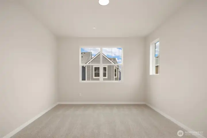 Large secondary bedroom with extra windows and mini-split AC/Heat Large secondary bedroom with extra windows and mini-split AC/Heat
