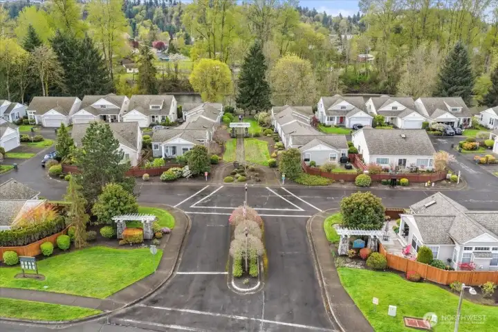 Inviting neighborhood entrance leading to the home's desirable location.