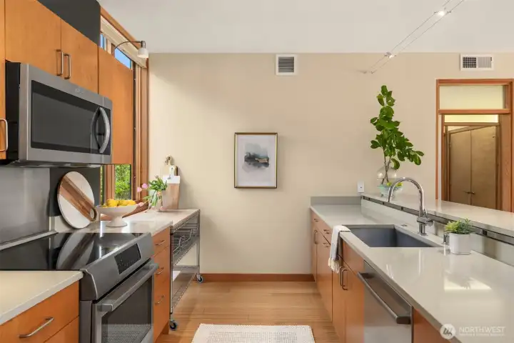 The galley layout with an excellent work triangle is incredibly efficient, allowing the chef to create masterpieces with minimal steps.