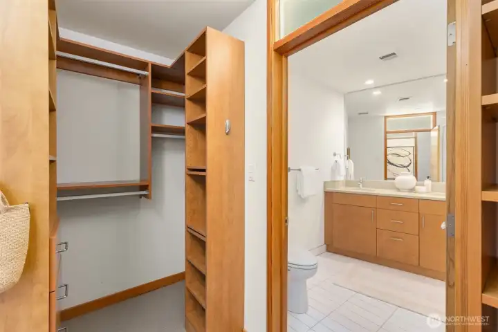 Here we see the other side of the closet, with thoughtful built-in storage to keep you organized.