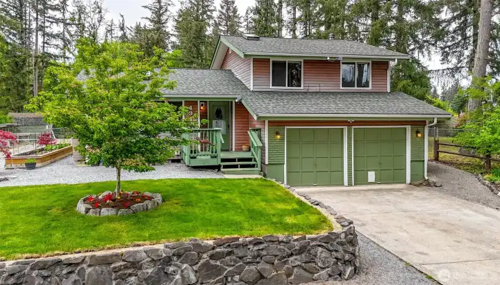 3 bedroom 2 bath tri level home on 1.042 acre lot with 2 outbuildings, chicken coop and custom shop.