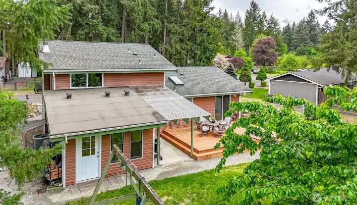 Aerial view of back deck and back door that leads to the flex room.