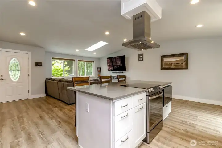This angle shows the front door and living area.