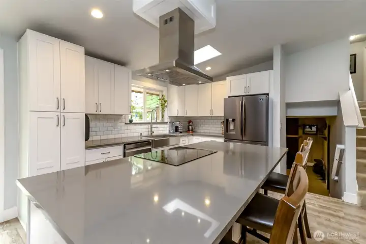 Beautiful quartz countertops, glass stovetop and built in microwave.
