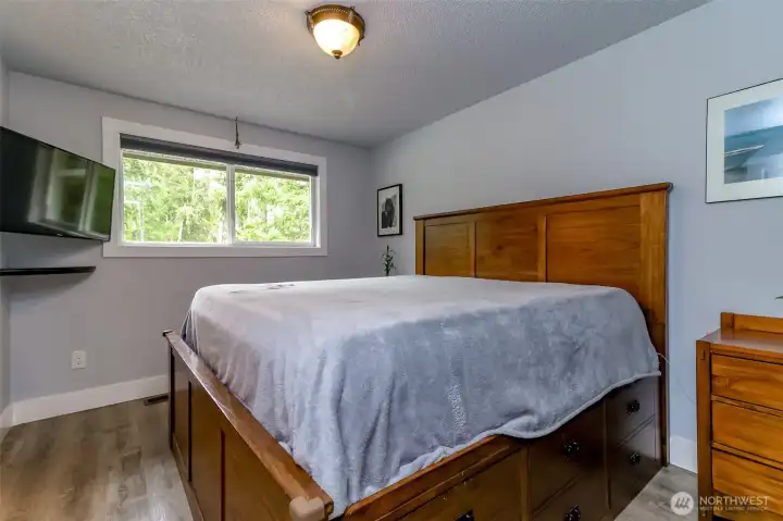 Primary bedroom with bathroom to the left of this picture.