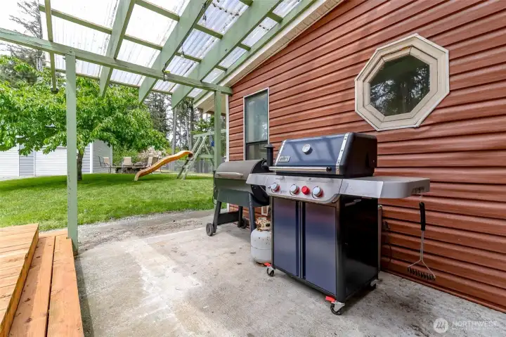 Covered patio for year round grilling.