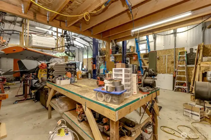 This work table will stay as well as will all the insulation above the paint booth seen in this picture.