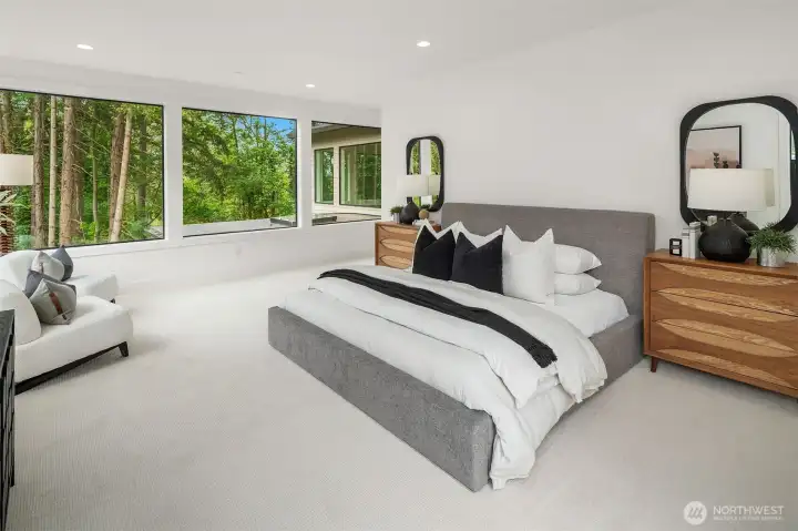 Designer primary suite with five-piece bath with heated floors