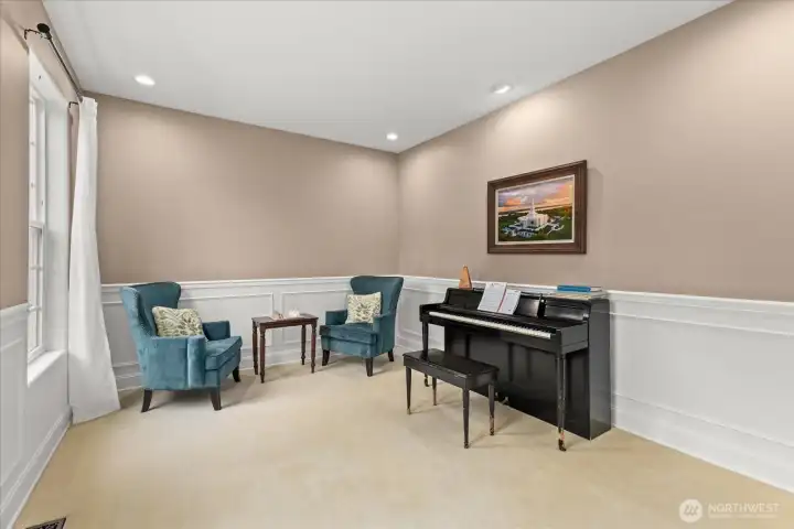 Flexible main-level rooms perfect for home offices, guests, or multi-generational living