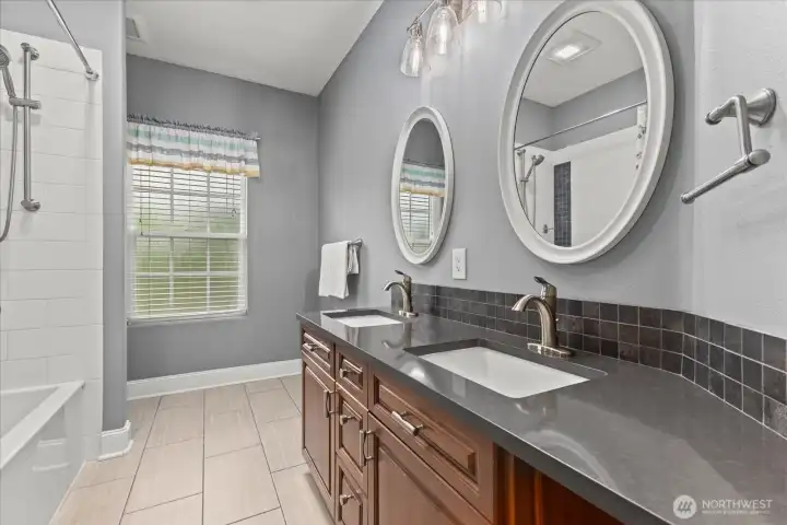 Dual vanities provide convenience and generous personal space