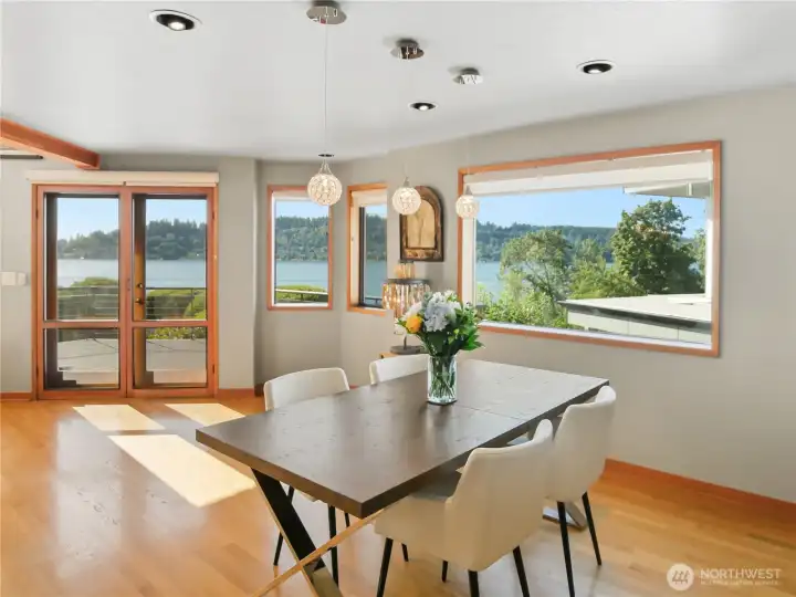 The panoramic view follows you throughout the main level — windows on every side keep Lake Washington always in sight