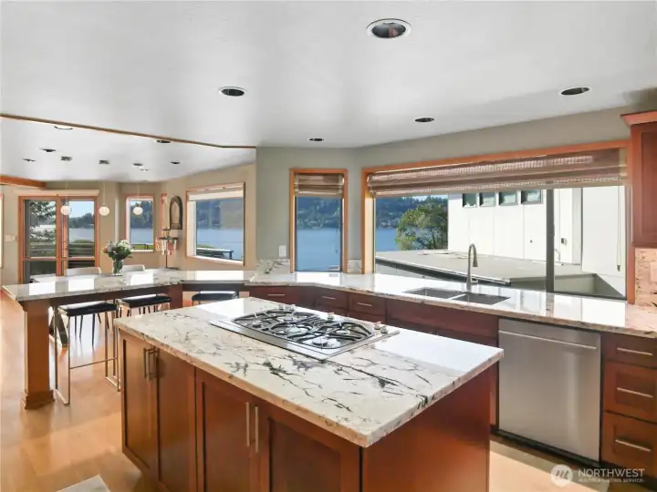 Sleek stainless appliances and an abundance of storage complete this kitchen built for both everyday living and entertaining
