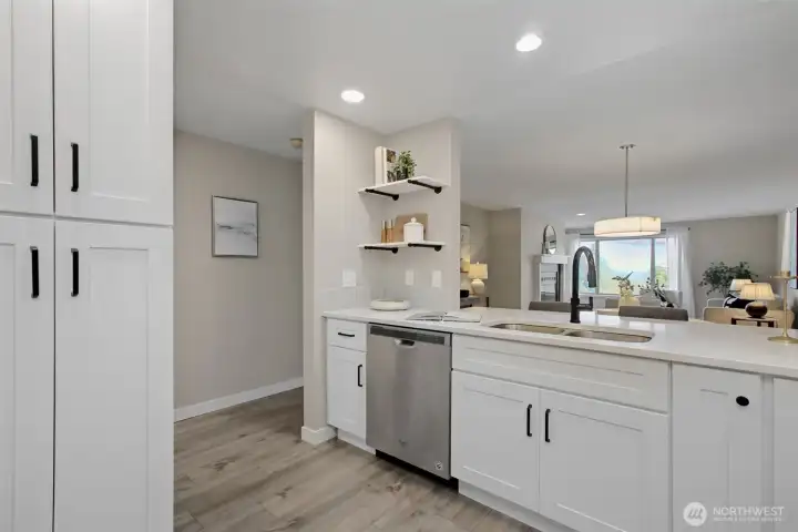 Kitchen opens up to the living area - you won't feel isolated from your guests when hosting