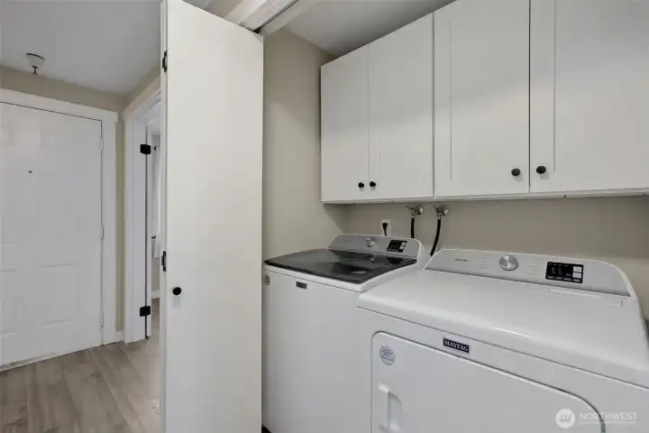Newer washer and dryer and plenty of cabinet space for ease