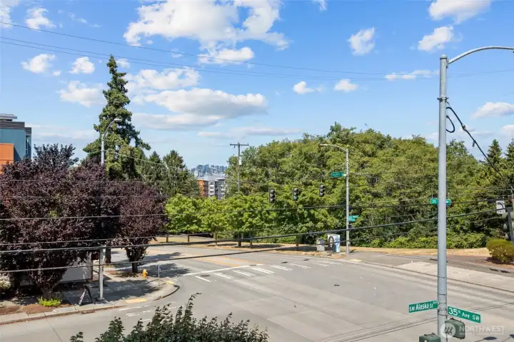Enjoy peekaboo views of Downtown Seattle from your balcony
